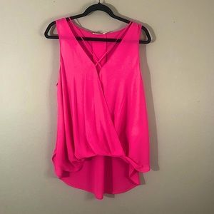 Bright pink sleeveless blouse